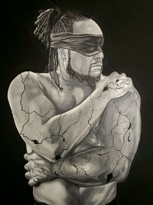 Graphite and charcoal drawing, 'In Pieces pt. 1.' The piece features the torso of a man wearing a blindfold. He crosses his arms to hold himself in a protective gesture, while cracks spiderweb across his skin, rendered with detailed shading to resemble fractured concrete. The monochrome artwork evokes a powerful sense of vulnerability and hidden turmoil.