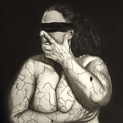 Graphite and charcoal drawing, 'In Pieces pt. 1.' The piece features the torso of a man wearing a blindfold. He crosses his arms to hold himself in a protective gesture, while cracks spiderweb across his skin, rendered with detailed shading to resemble fractured concrete. The monochrome artwork evokes a powerful sense of vulnerability and hidden turmoil.